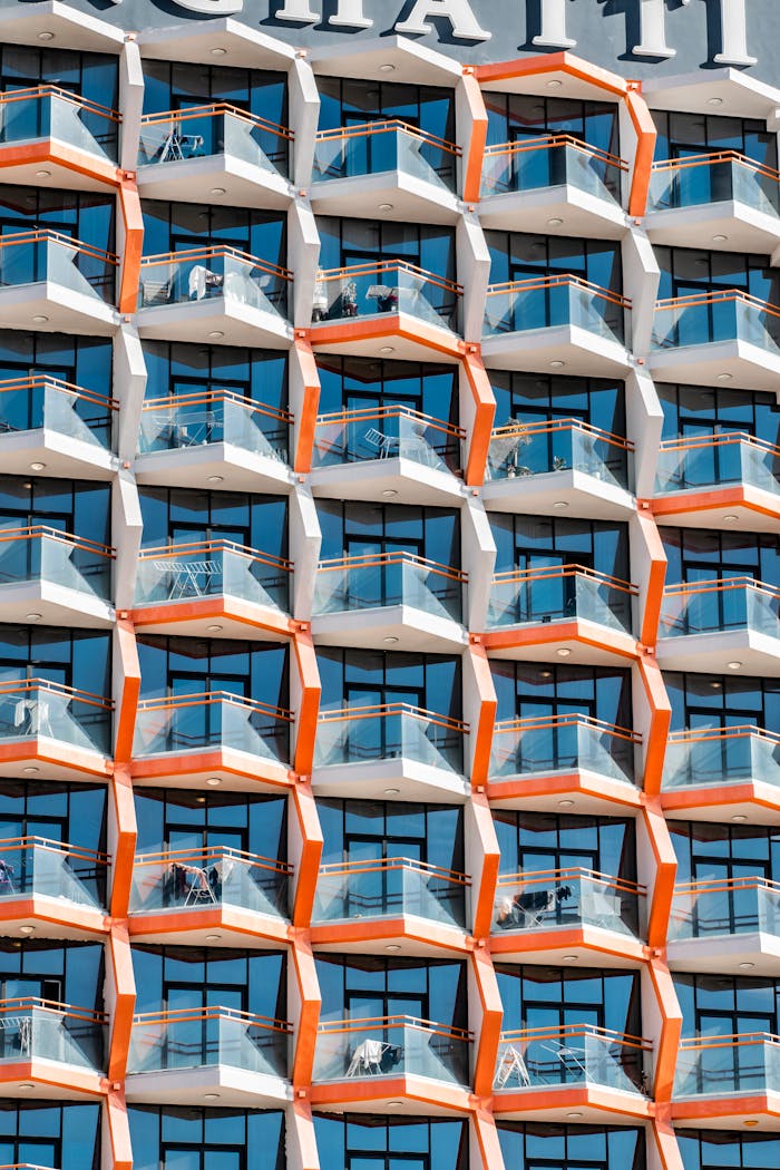 Close-up of modern geometric apartment balconies in Dubai showcasing innovative architectural design.