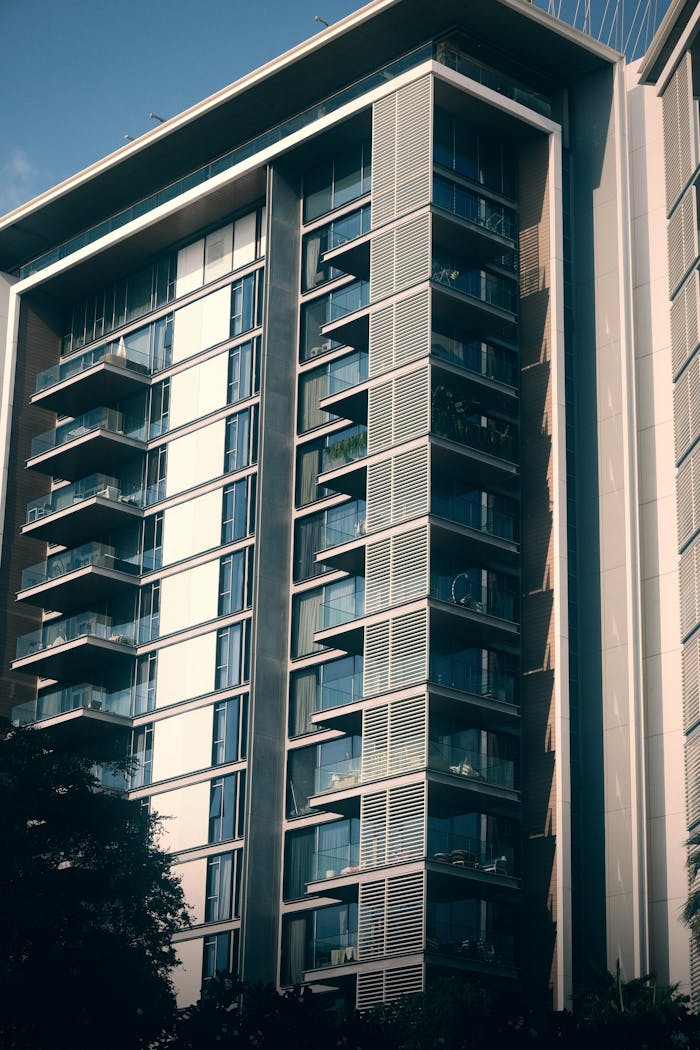Contemporary high-rise apartment with modern design and clean lines in an urban setting.